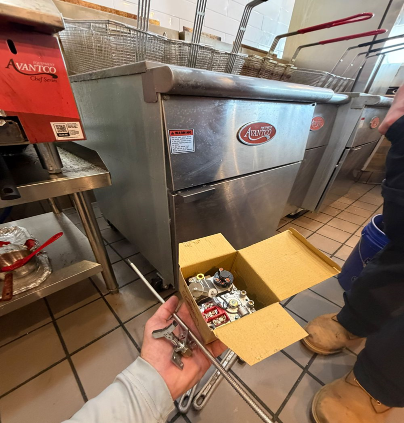 Arriving on site at the Jacksonville restaurant with the replacement gas valve, ready to inspect the fryer's gas line.