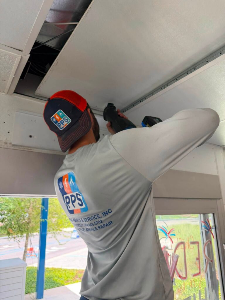 Mounting the air curtain bracket above the walk-up window opening during installation