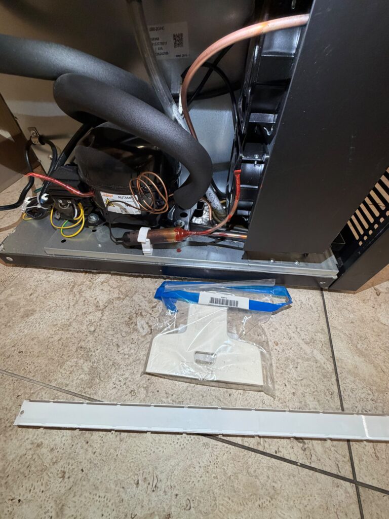 Replacement components staged and ready during the service visit.