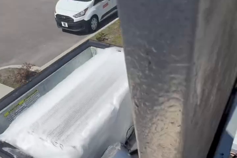 Heavy ice buildup on an evaporator coil during a Pappas Parts & Service call.