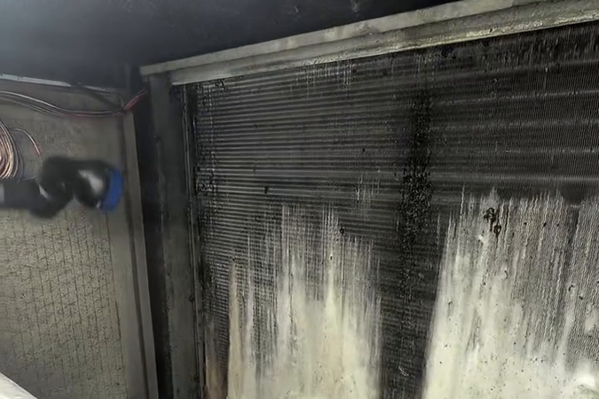 Heavy dirt and residue built up on the evaporator coil.