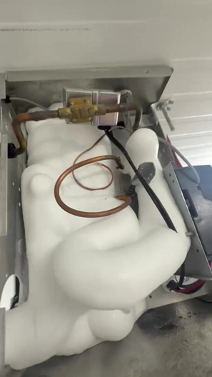 Heavy frost on an evaporator unit a warning sign that airflow or defrost needs attention.