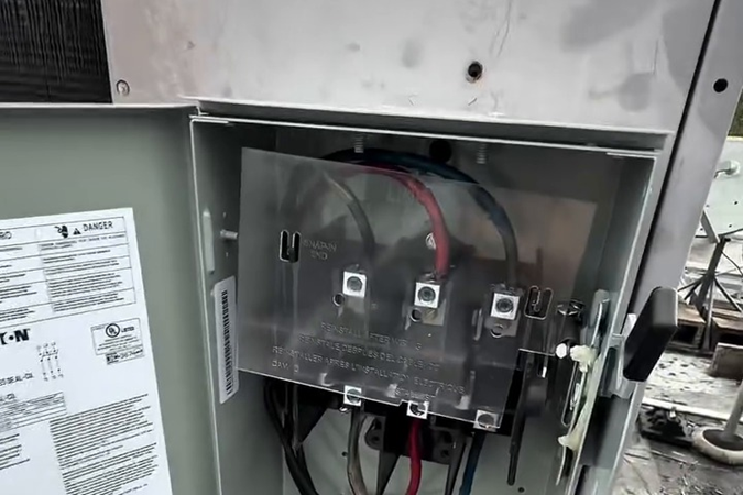 The rooftop electrical disconnect that supplies power to the unit.